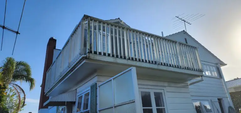 A back balcony with wooden fences that needed waterproofing and re-building services to improve and bring more value to the property, preparing it for the Auckland house market