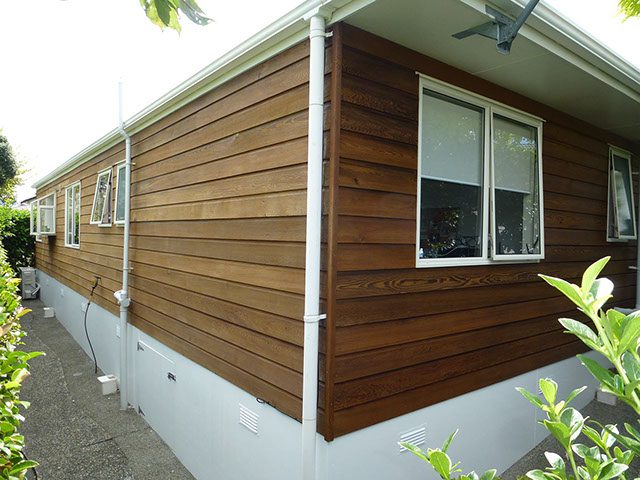 Exterior washing and rejuvenation with cedar stain and wood staining services, painting services.