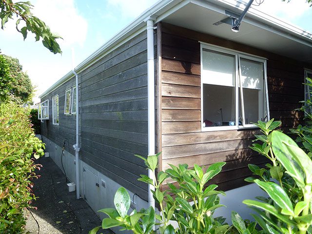 Exterior washing and rejuvenation with cedar stain and wood staining services, painting services.