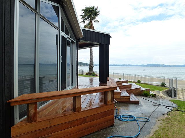 A deck that has been rejuvenated, with deck services that improve the value of the property.