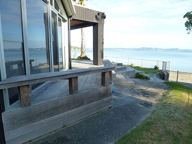 Decking renovation with a deck in need of rejuvenation and deck repair.