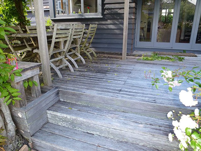 Patio deck wood staining and cleaning services.