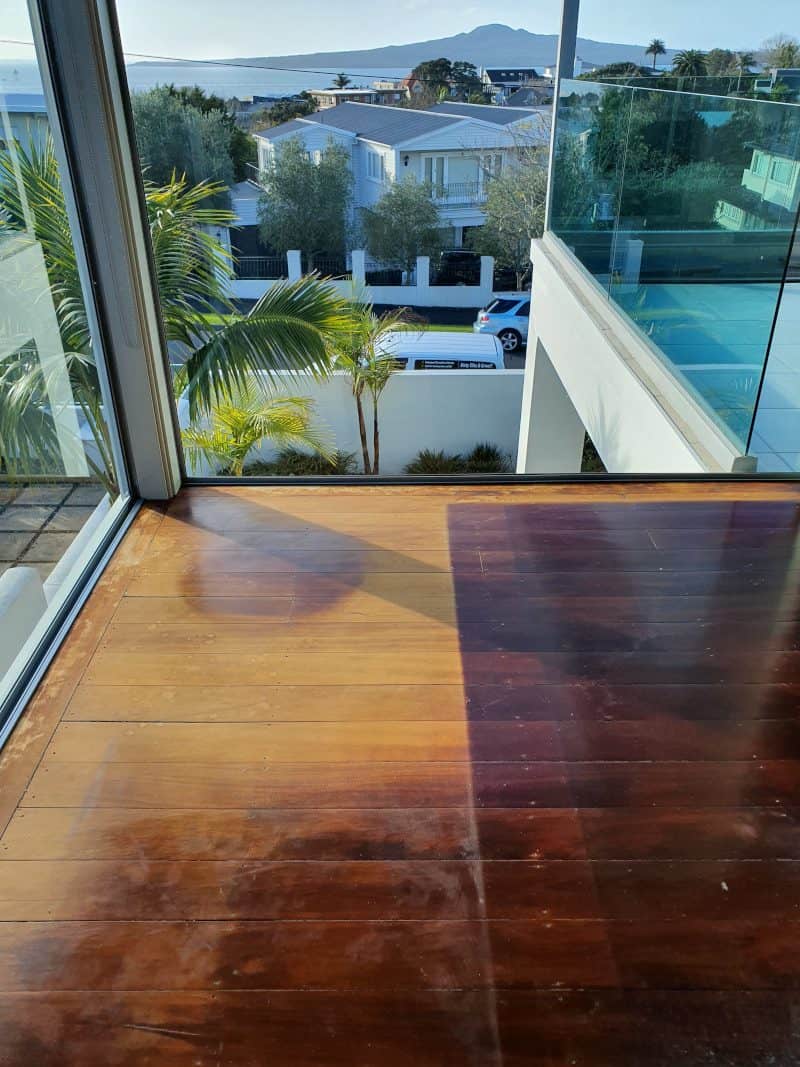 there is sunfade on the timber floor where the dark wood faded from the sun and was repaired with trade services for sunfade.