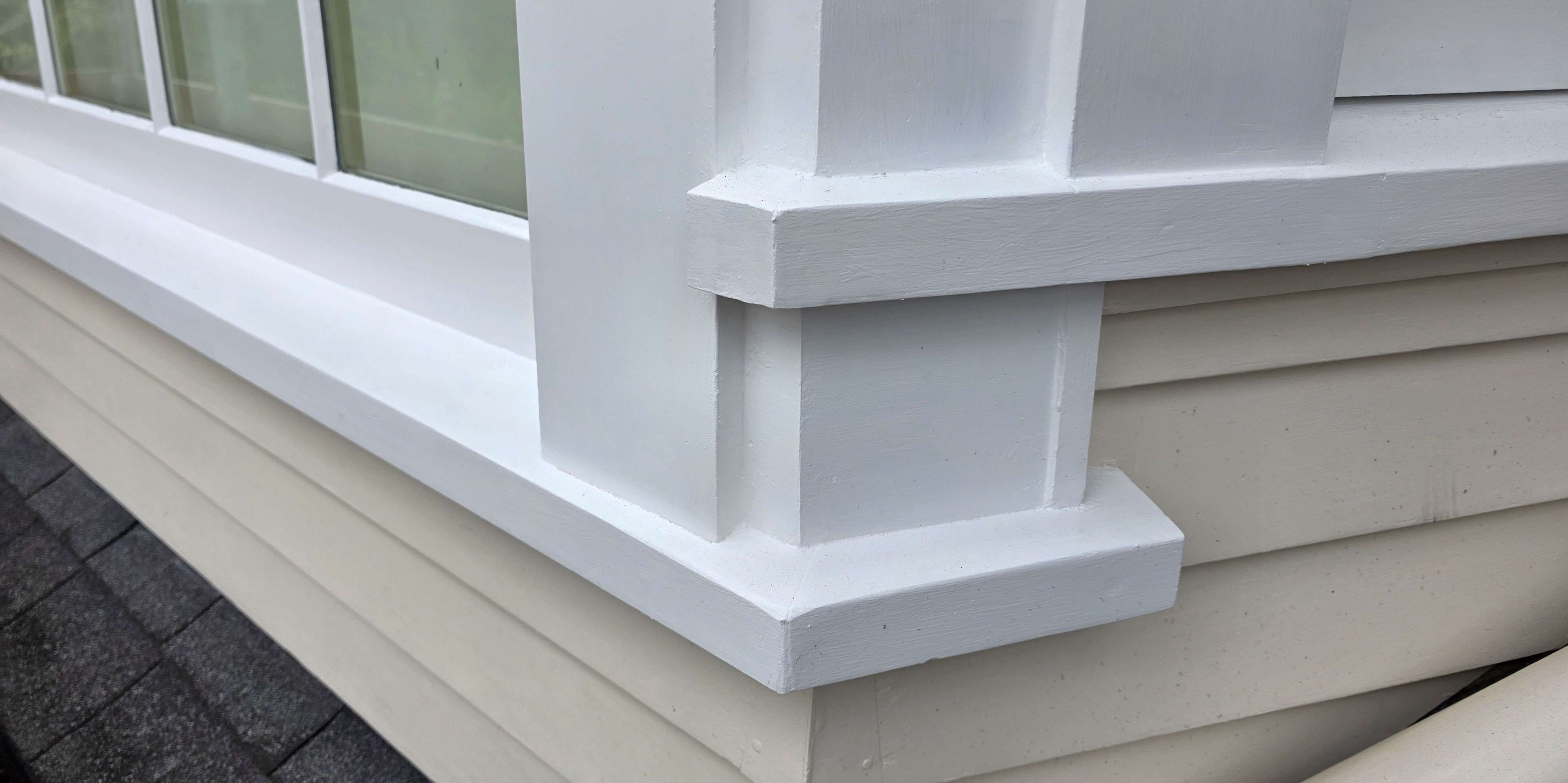 Repaired white window trim showing no rot, a Market Ready past project, enhancing curb appeal and home value.
