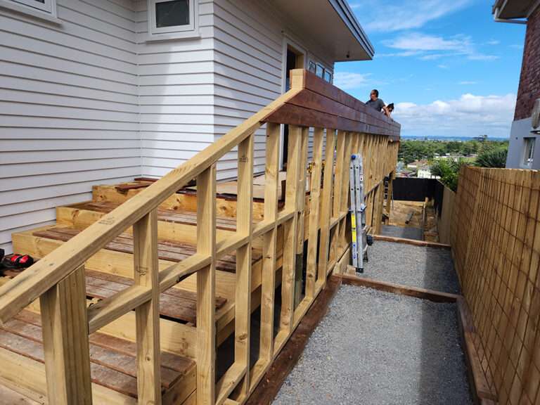 Market Ready project: Wooden handrail construction for outdoor stairs, enhancing accessibility and safety of the property.
